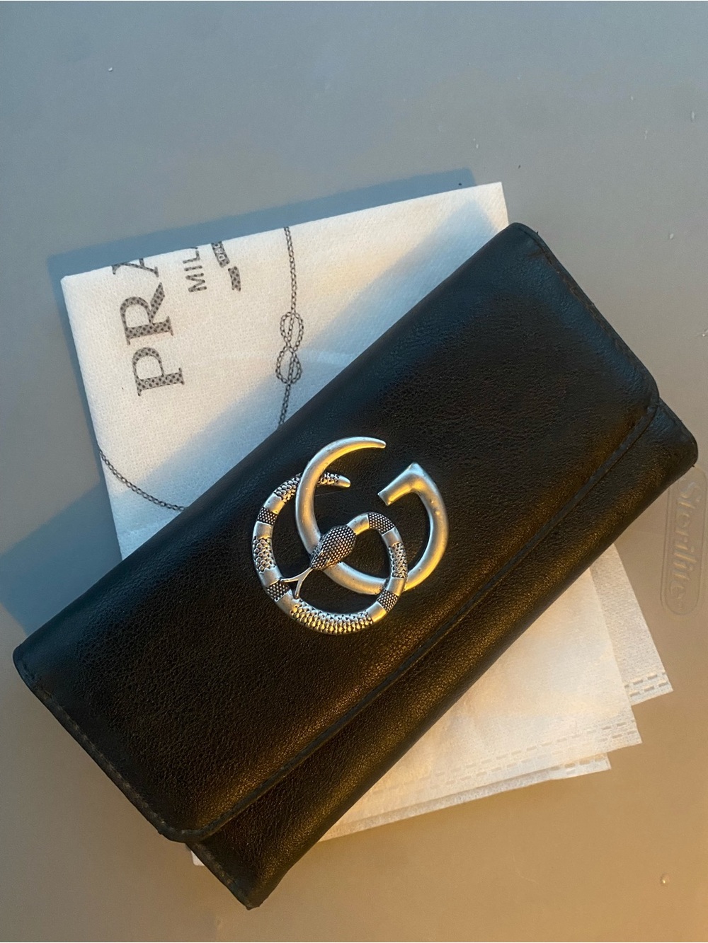 Black Wallet a w/ Interlocking Metal Emblem!